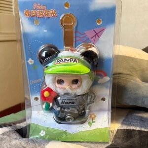 Nora panda character spring flower parade plush keychain